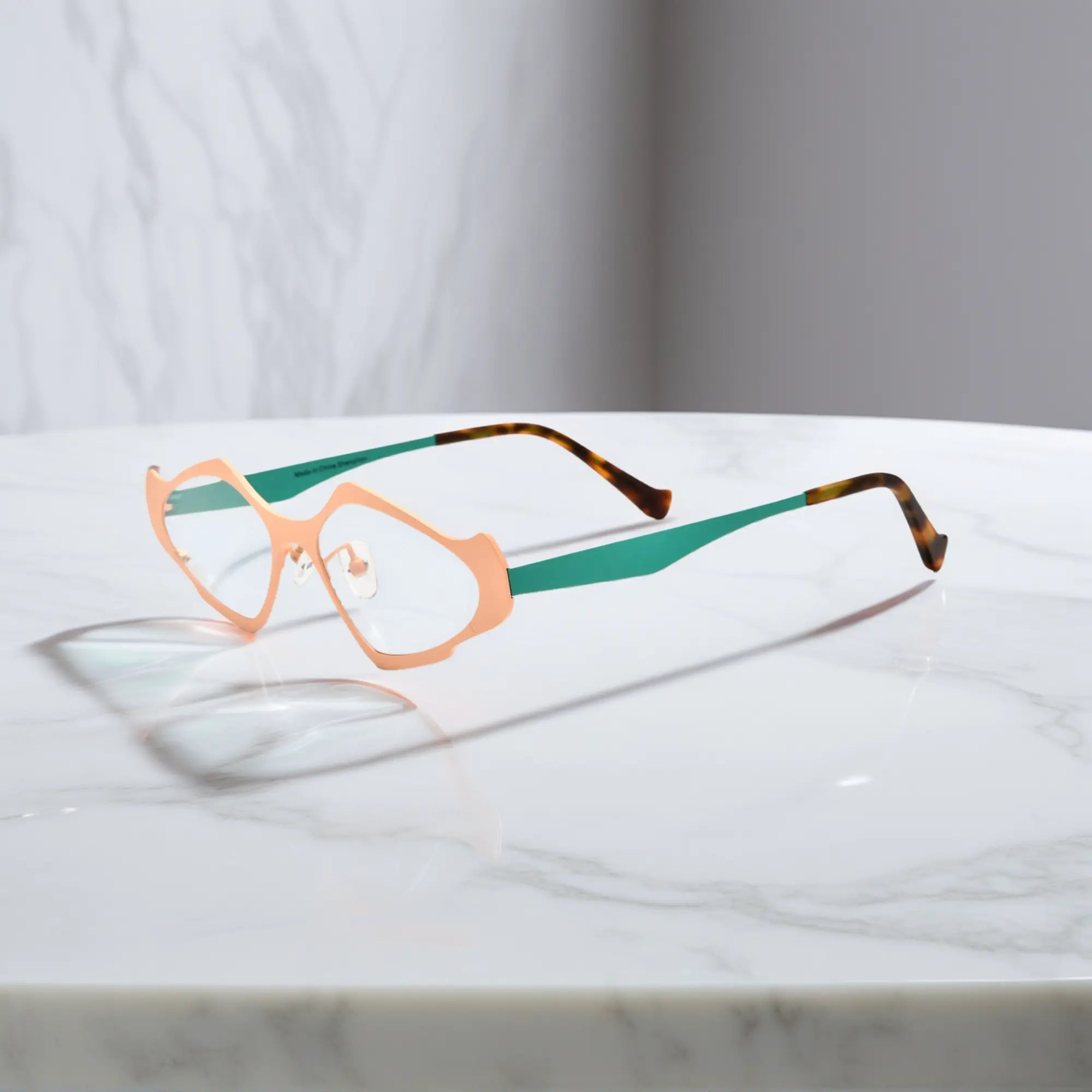 Side profile of VoyueLens™ VL185811 Coral Jade titanium geometric eyeglasses